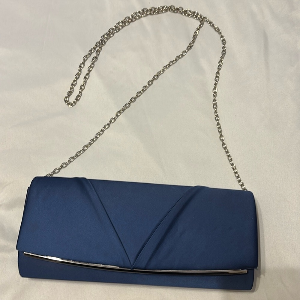 Dressy blue clutch with silver strap and silver detail